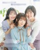 A group of three young women posing for a magazine cover.