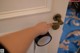 A person opening a door with a magnifying glass.